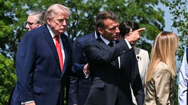 US President Donald Trump and French President Emmanuel Macron at the G7 summit. AFP