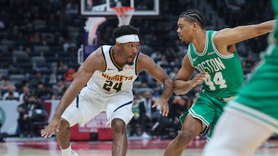 Jalen Pickett, left, of Denver Nuggets and Jaden Springer of Boston Celtics during the NBA Abu Dhabi Games. Victor Besa / The National