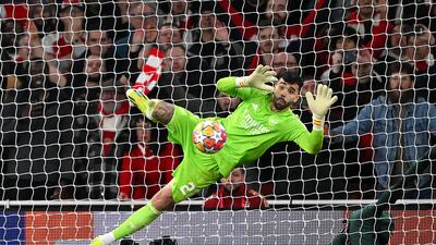 David Raya makes the match-winning save from the fourth penalty from Galeno. Getty Images