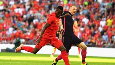 Liverpool forward Divock Origi scores his team’s third goal. Mike Hewitt / Getty Images