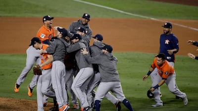 The Houston Astros celebrate their victory over the Los Angeles Dodgers in Game 7 at Dodger Stadium. The Astros won 5-1 to clinch the World Series 4-3. Jae C Hong / AP Photo