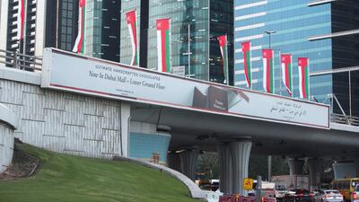 Omani flags on display at Sheikh Zayed Road roundabout. Leslie Pableo for The National