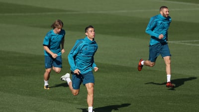 Real Madrid’s Cristiano Ronaldo, Luka Modric, and Karim Benzema are put through their paces. Sergio Perez / Reuters