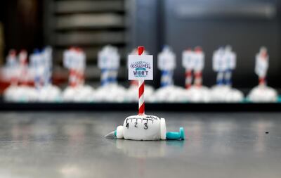Cakes in the shape of vaccination syringes at a bakery in Dortmund, Germany, January 9. Reuters