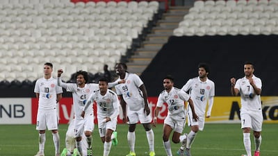 Al Jazira players celebrate as they win the penalty shoot-out against Al Sadd on Tuesday night. Adil Al Naimi / Al Ittihad