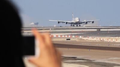Etihad Airways' Airbus A380 makes its first landing on the new south runway of Abu Dhabi International Airport. Ravindranath K / The National
