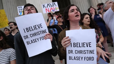 Protesters demonstrate on the steps of the US Supreme Court building in Washington against the swearing in of Brett Kavanaugh. Reuters/Jonathan Ernst
