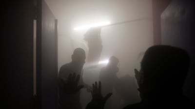 Palestinian paramedics inspect damage in the patient rooms caused by the Israeli strikes on the maternity ward at Nasser Hospital in Khan Younis, southern Gaza. AP