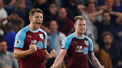Burnley's Ashley Barnes and James Tarkowski celebrate after the match. Reuters