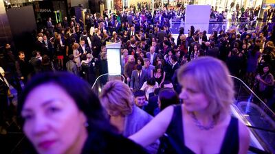 People attend the launch of Capital Partners' Esentai Mall.