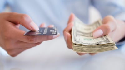 Consumers on lower incomes, earning between $1,350 to $2,800 a month, gave credit card issuers the worst scores, according to the study from Insight Discovery. Getty Images