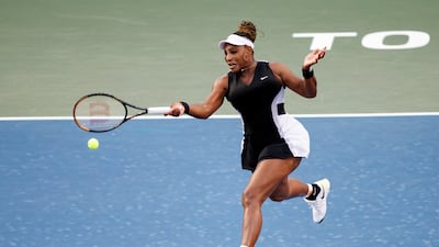 Serena Williams returns a ball during her match against Belinda Bencic. Reuters