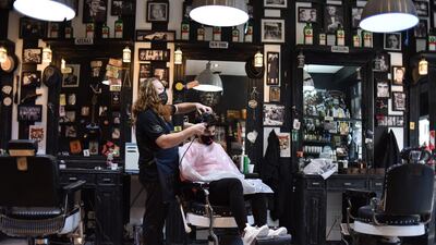 A stylist cuts a customer's hair at the barber shop The Barber Job in Buenos Aires, Argentina. Getty Images