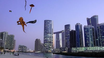 Kites fly in the air on the first day of the Reem Festival at the Al Reem Central Park. All photos by Victor Besa/The National
