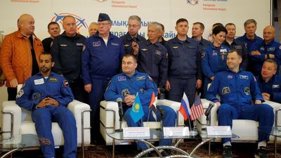 From left to right: Hazza Al Mansouri with Russian cosmonaut Alexey Ovchinin, and US astronaut Nick Hague. Reuters
