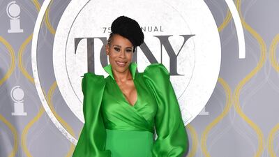 US playwright and actress Dominique Morisseau in a floor-length, sleeved green gown. AFP