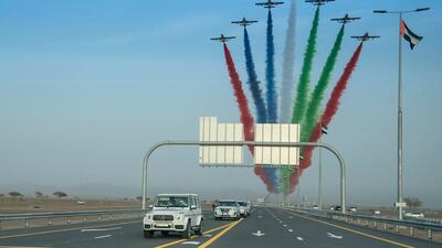 Al Fursan, the UAE Airforce’s aerobatic display team, flies overhead as Sheikh Mohammed and Sheikh Mansour tour the projects.