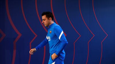 Barcelona manager Xavi Hernandez arrives for the press conference at Joan Gamper sports city on the eve of the match against Sevilla. EPA