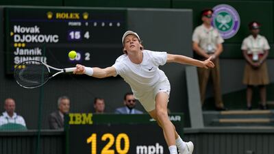Jannik Sinner returns to Novak Djokovic. AP