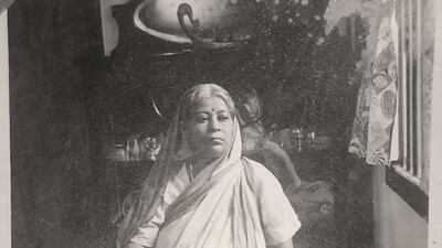 The person who submitted the object also shares this image of their grandmother at the table.