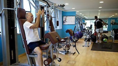 German expatriate Gerd Pfeiffer, 63, at his gym at the Park Rotana Residence in Abu Dhabi. Christopher Pike / The National