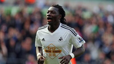 Bafetimbi Gomis was a target for Al Ahli, although Swansea City were keen for the striker to remain at the Premier League club. Geoff Caddick / AFP