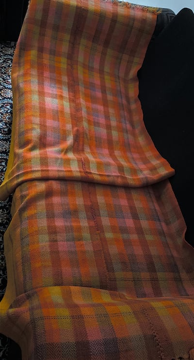 The heirloom blanket, or jodaliyyah, that has been a wedding gift for two generations of Iraqi women. Courtesy Shubbak