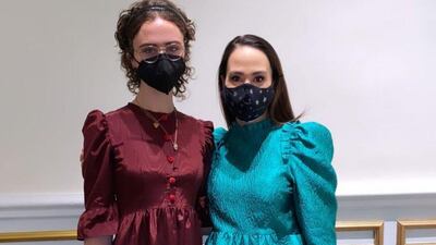 Ella Emhoff wore a burgundy dress by New York designer, Batsheva to attend the inauguration with Kamala Harris's niece, Meena. Instagram