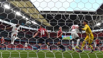 Raheem Sterling of England jumps to head his goal. EPA