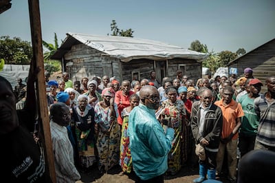Congolese returning from Kimoka gather for a visit by UN High Commissioner for Refugees Filippo Grandi, in Sake, eastern DRC, on August 29. AFP