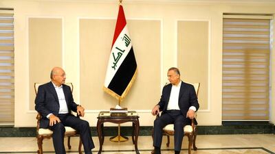 Iraqi Prime Minister Mustafa Al Kadhimi, left, meeting Iraq's President Barham Salih in Baghdad on November 7, 2021. Reuters