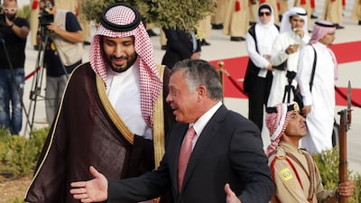 King Abdullah and Prince Mohammed bin Salman at the royal palace in Amman in 2015. AFP