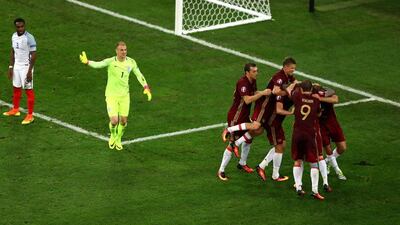 Russian plauers celeberate their injury-time equaliser during the Uefa EURO 2016 Group B match between England and Russia at Stade Velodrome on June 11, 2016 in Marseille, France. Michael Steele/Getty Images