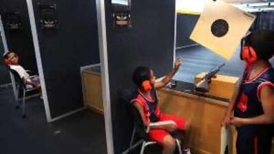 The bin Baroot brothers, from left, Mansour, Ahmed and Saood, at the Ramadan shooting camp at the Caracal Shooting Club in Abu Dhabi.