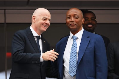 Confederation of African Football president Patrice Motsep, right, has come to the defence of embattled Fifa counterpart Gianni Infantino. AFP