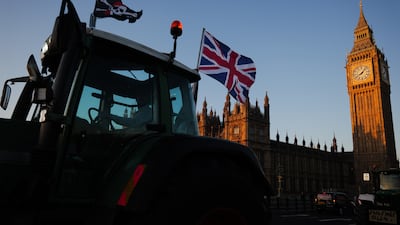 Farmers protest before the UK budget announcement, outside the Houses of Parliament in London. Bloomberg