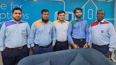 The Hala Home initiative supports about 14,000 drivers under five taxi franchises. Left to right: drivers Manzoor Shah; Alamin Chowdry; Hazrat Farooq; Shahzaib Hassan; Emmanuel Daniel. Dona Cheriyan / The National
