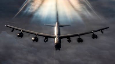 A US Air Force B-52H Stratofortress bomber prepares to refuel from a KC-135 Stratotanker during Operation Epic Fury over the Middle East. AFP