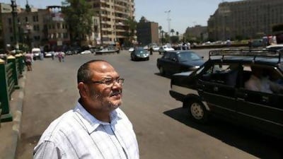 Osama Rushdi in Tahrir Square, made famous throughout the world by the hundreds of thousands of protesters who gathered there at the high of Egypt's recent uprising. A former Gama'a Islamiya official, Mr Rushdi returned to Egypt on June 15 after two decades in exile.
