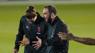 Cristiano Ronaldo and Gonzalo Higuain during training. Reuters