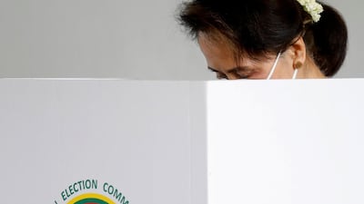 Myanmar State Counselor Aung San Suu Kyi casts an advance vote in Naypyitaw. Reuters