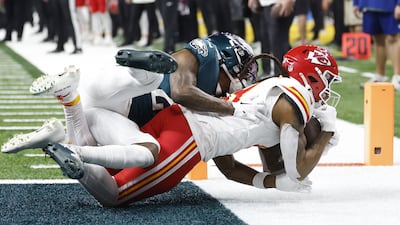 Kansas City Chiefs wide receiver DeAndre Hopkins (R) scores a touchdown. EPA