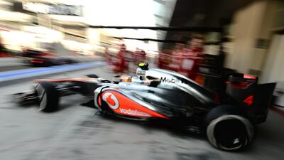 Lewis Hamilton leaves his garage en route to setting the quickest first practice time ahead of the Abu Dhabi Formula One Grand Prix. Dimitar Dilkoff/AFP