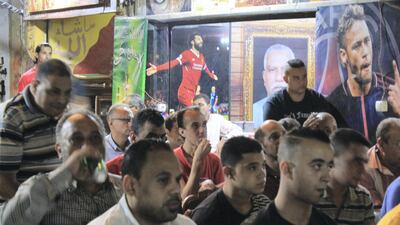 Liverpool fans celebrate in Cairo. Adham Youssef