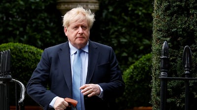 Boris Johnson outside his London home on Wednesday, hours before appearing before the Privileges Committee in parliament. Reuters