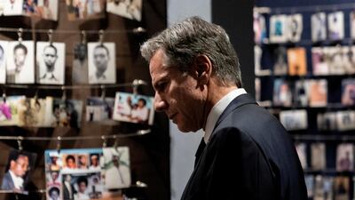 Mr Blinken visits the genocide memorial in Kigali. Reuters