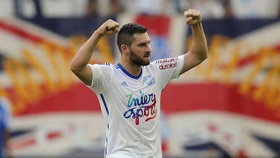 Marseille's Andre-Pierre Gignac celebrates after scoring against Toulouse during their Ligue 1 victory on Sunday. Jean-Paul Pelissier / Reuters / October 19, 2014