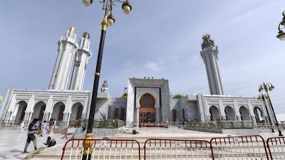 People wander on the esplanade of the Great Mosque of the Mourides in Dakar, on Wednesday before the inauguration that will take place on Friday. AFP