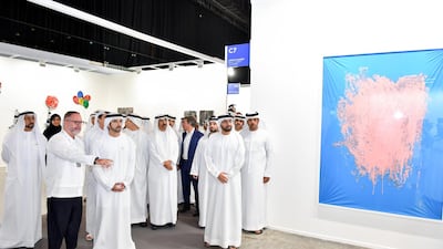 Sheikh Hamdan tours the exhibit.