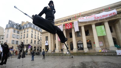 Dancers perform in front of the Theatre de l'Odeon in Paris, France. Workers have occupied the Theatre de l'Odeon since March 4 to protest against the French government's decision to close all theatres. Getty Images